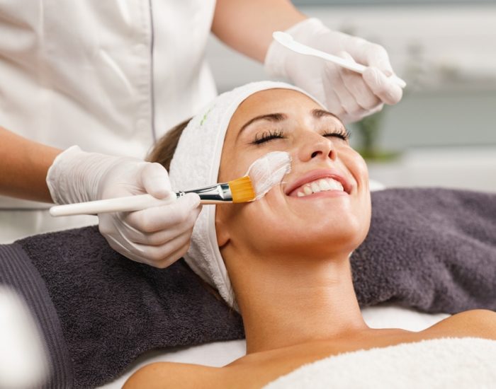 Shot,Of,A,Beautiful,Young,Woman,Getting,A,Facial,Mask